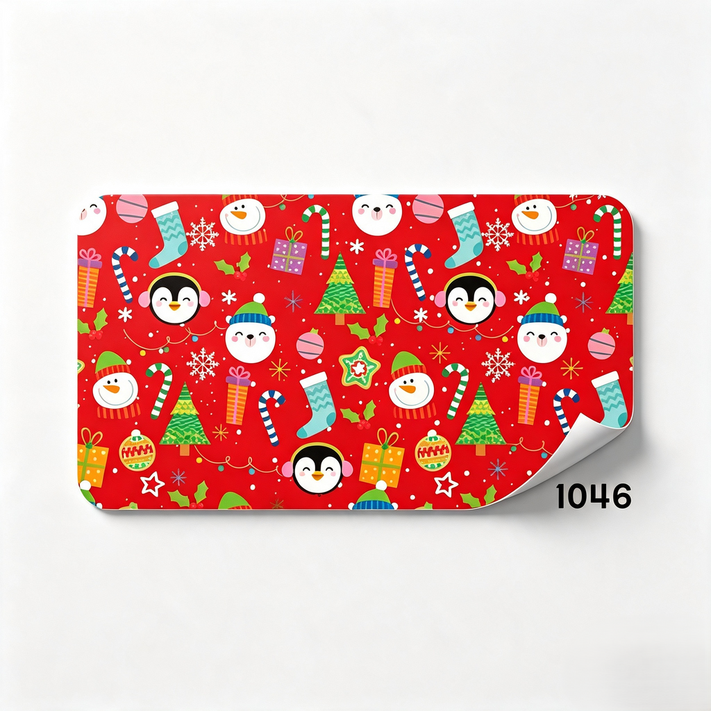 PAPEL DE REGALO NAVIDEÑO MUÑECOS Y BASTONES FONDO ROJO 70GR PLIEGO CREEAR 1046